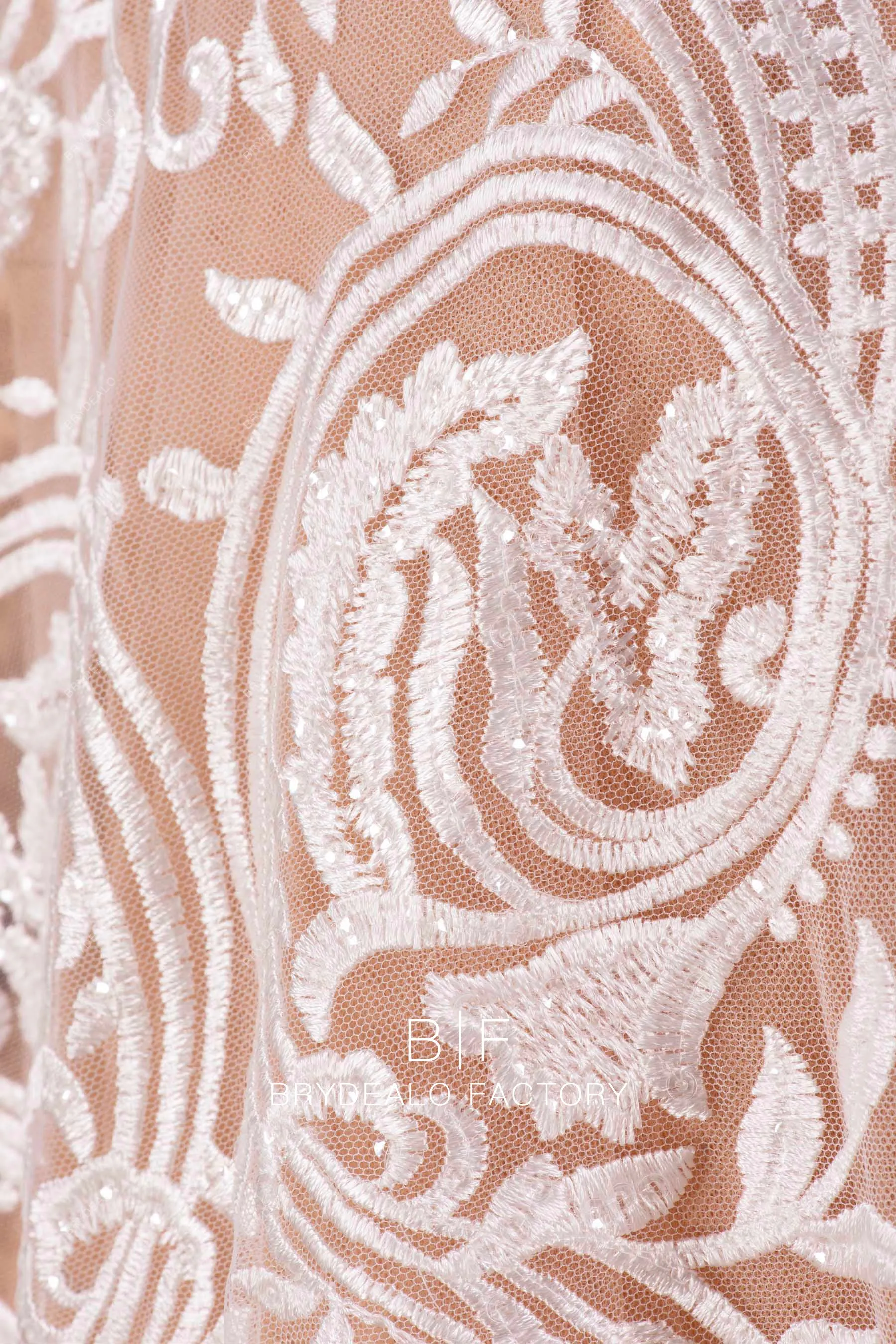 Designer Shimmer Totem Motif Embroidered Lace Online