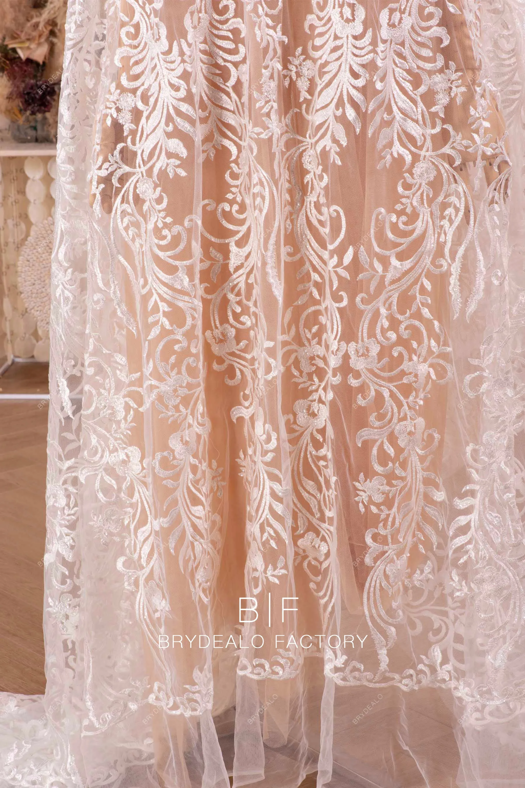 Designer Shimmer Totem Motif Embroidered Lace Online