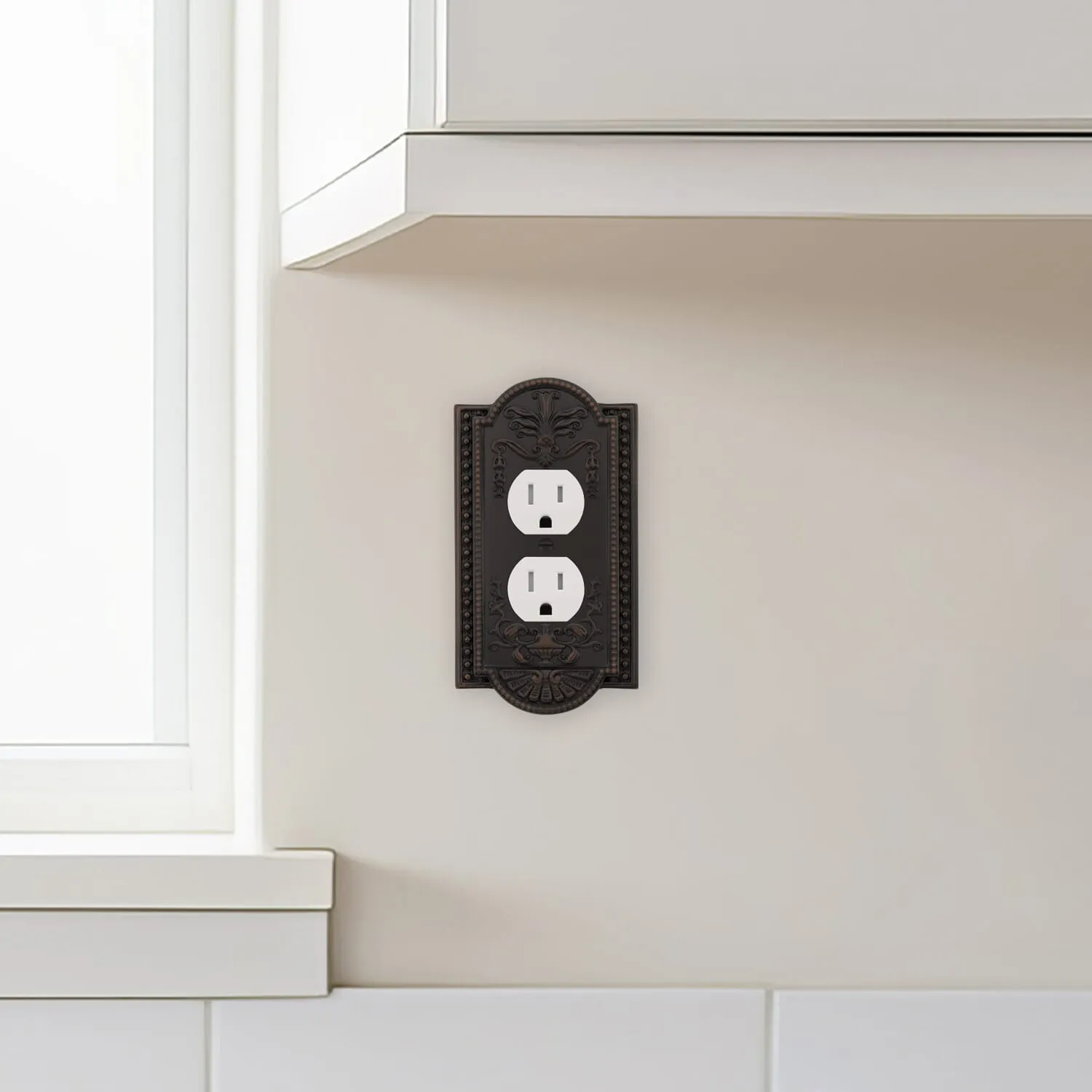 Meadows Switch Plate with Outlet in Timeless Bronze
